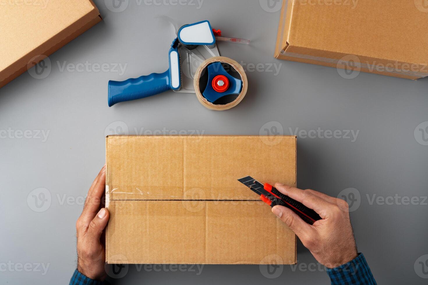 Above table top view of warehouse preparing post courier delivery package photo