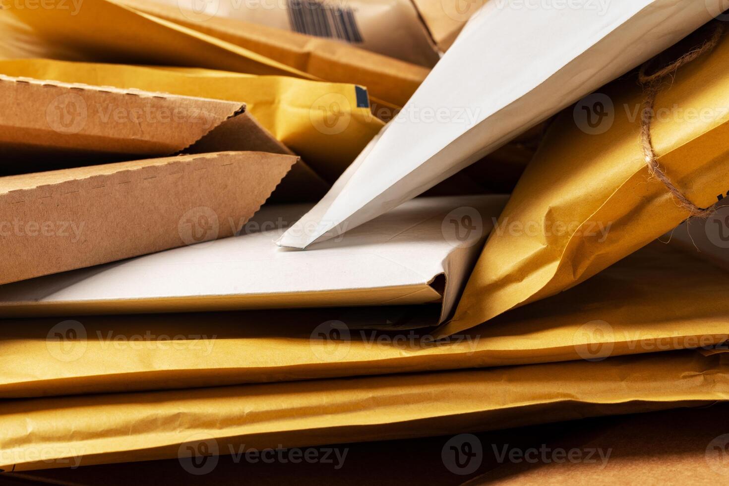 Close up shot of stack of padded mailing envelopes photo