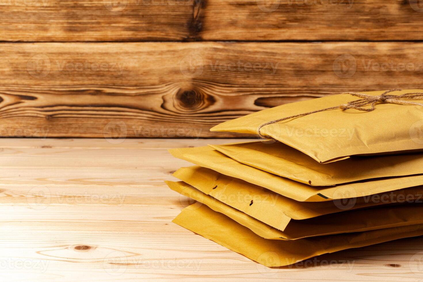 Close up shot of stack of padded mailing envelopes photo