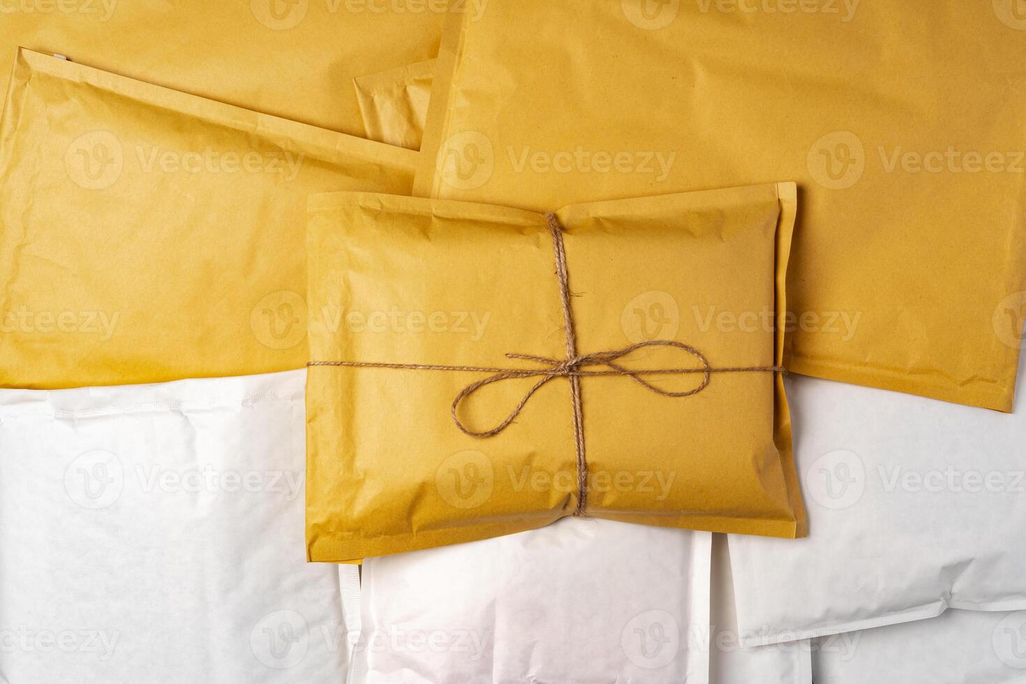 Close up shot of stack of padded mailing envelopes photo