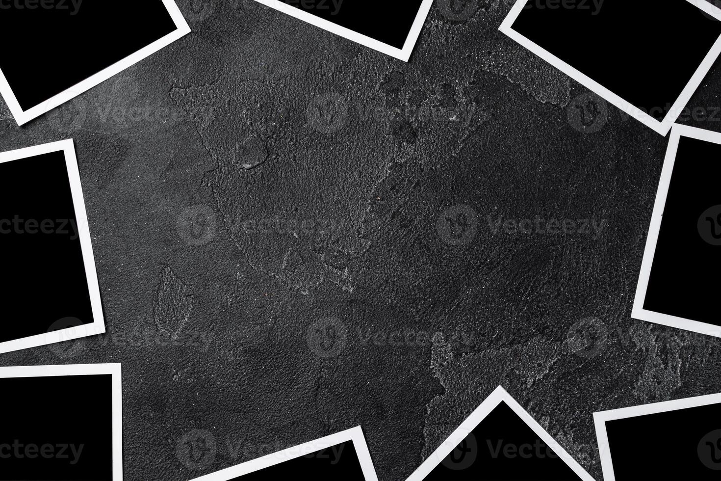 Paper photo frames with blank space on gray textured background