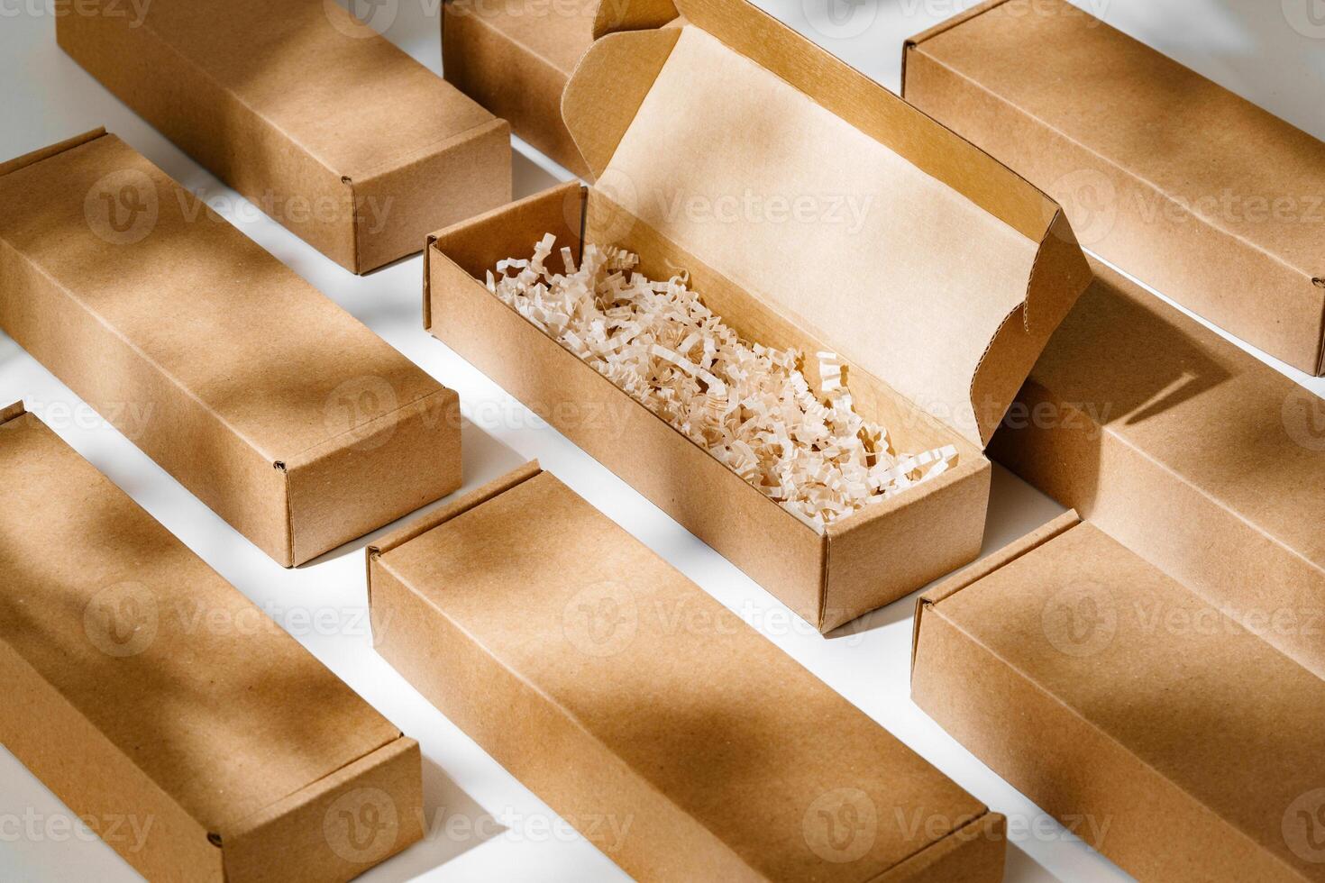 Brown cardboard boxes arranged neatly on a workspace, showcasing packaging materials for shipping and storage activities photo
