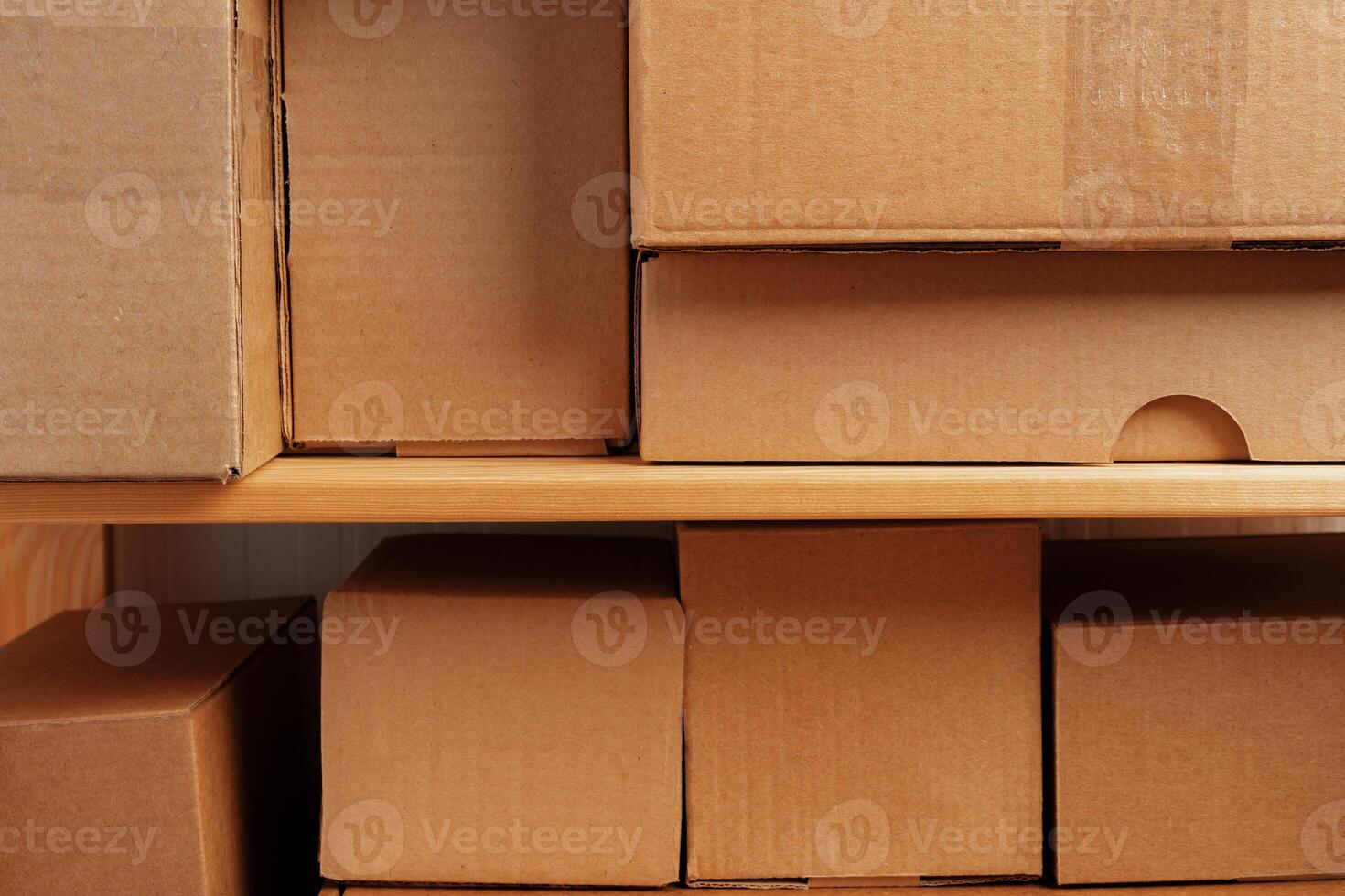 Cardboard boxes stacked in a pile for background photo