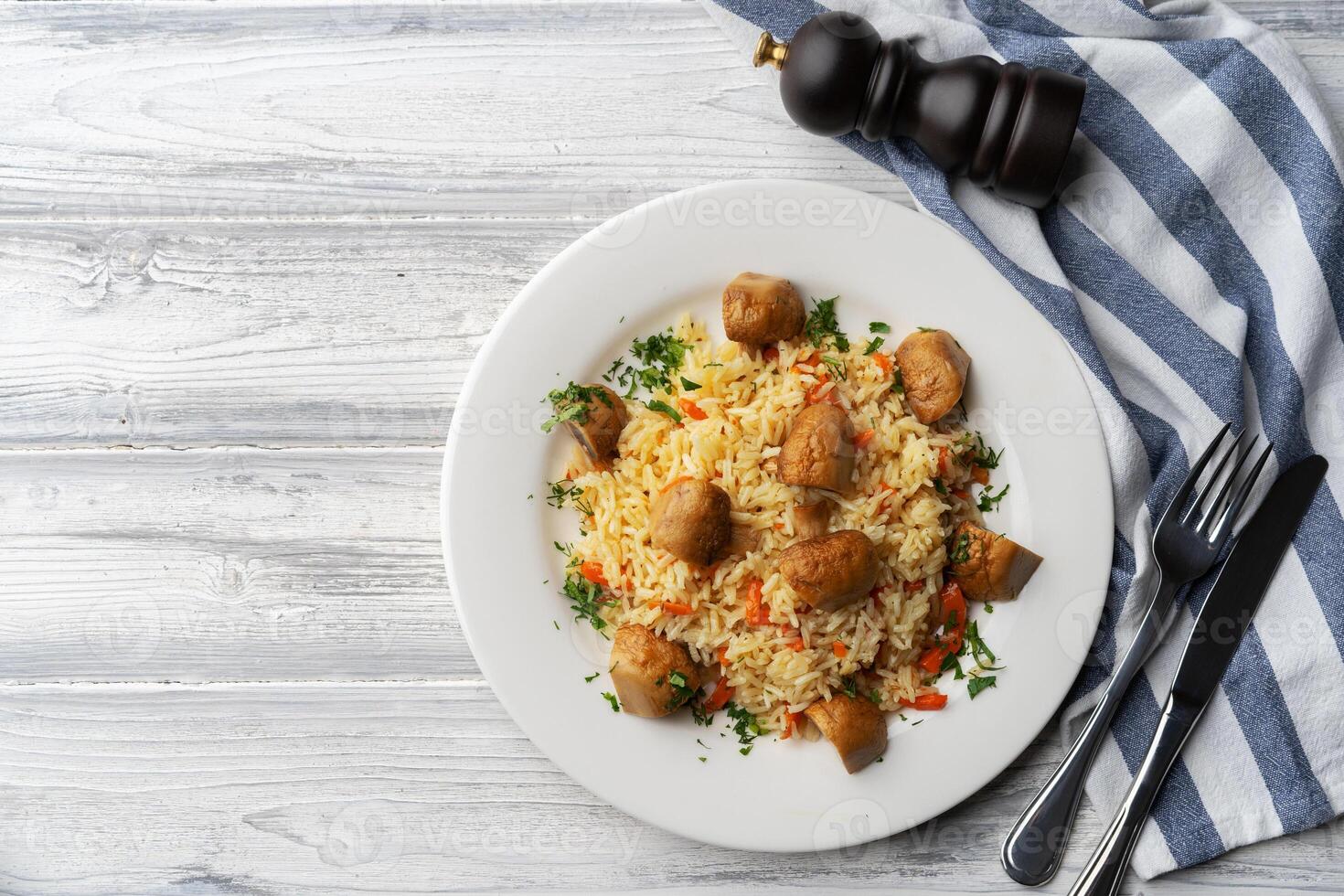 Plate with delicious homemade pilaf with meet photo