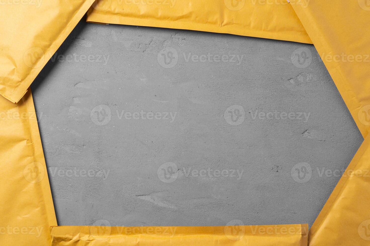 Lot of yellow paper postal envelopes. Top view. photo