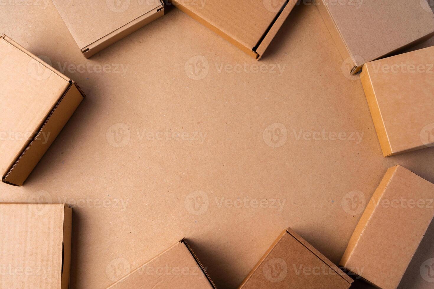 Cardboard box on beige background in studio photo