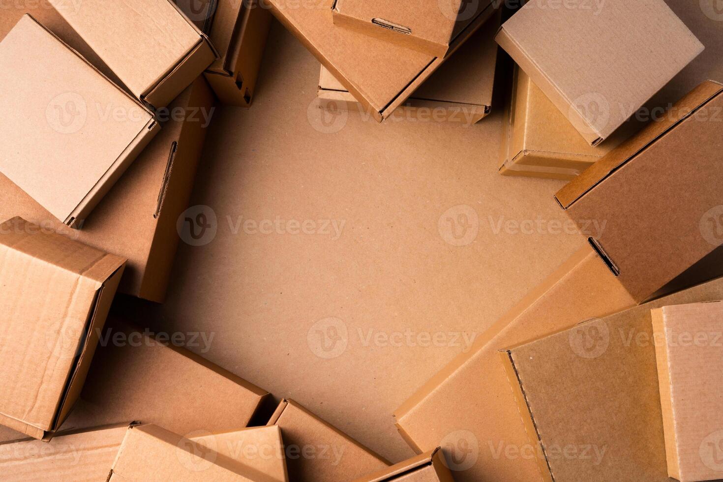 Cardboard box on beige background in studio photo