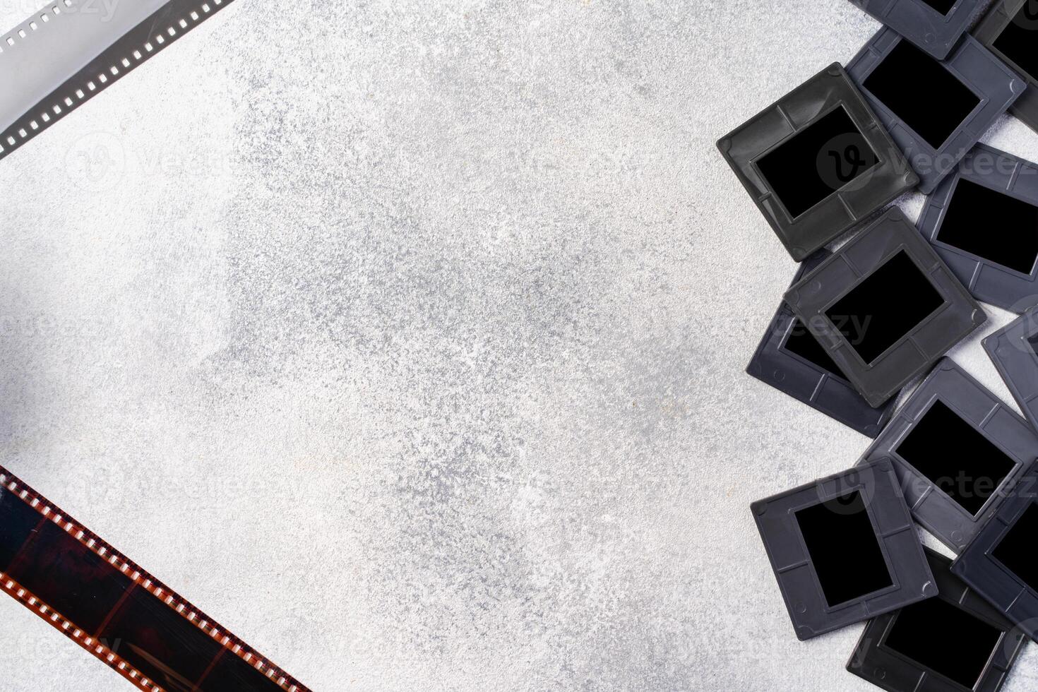 Photography empty slide frames on gray background photo
