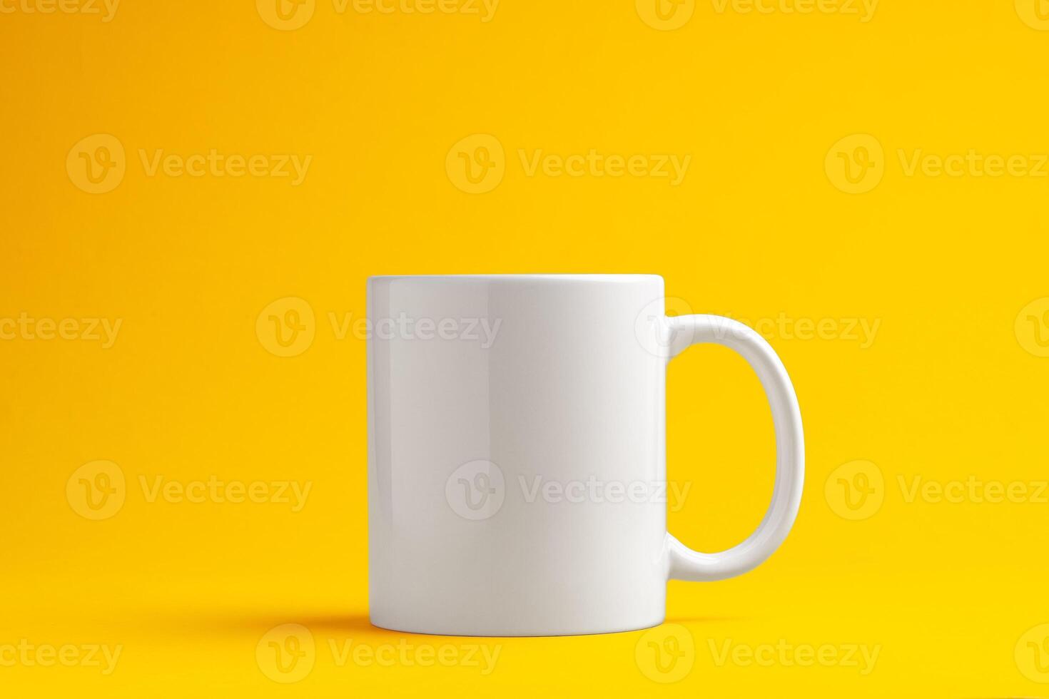 Ceramic mug on yellow studio background close up photo
