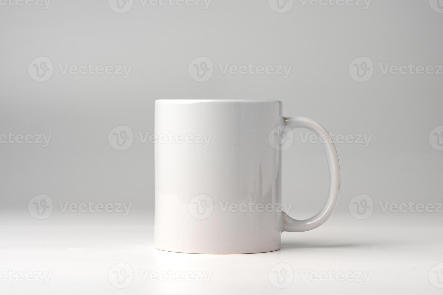 Blank white coffee mug mock up on white background photo
