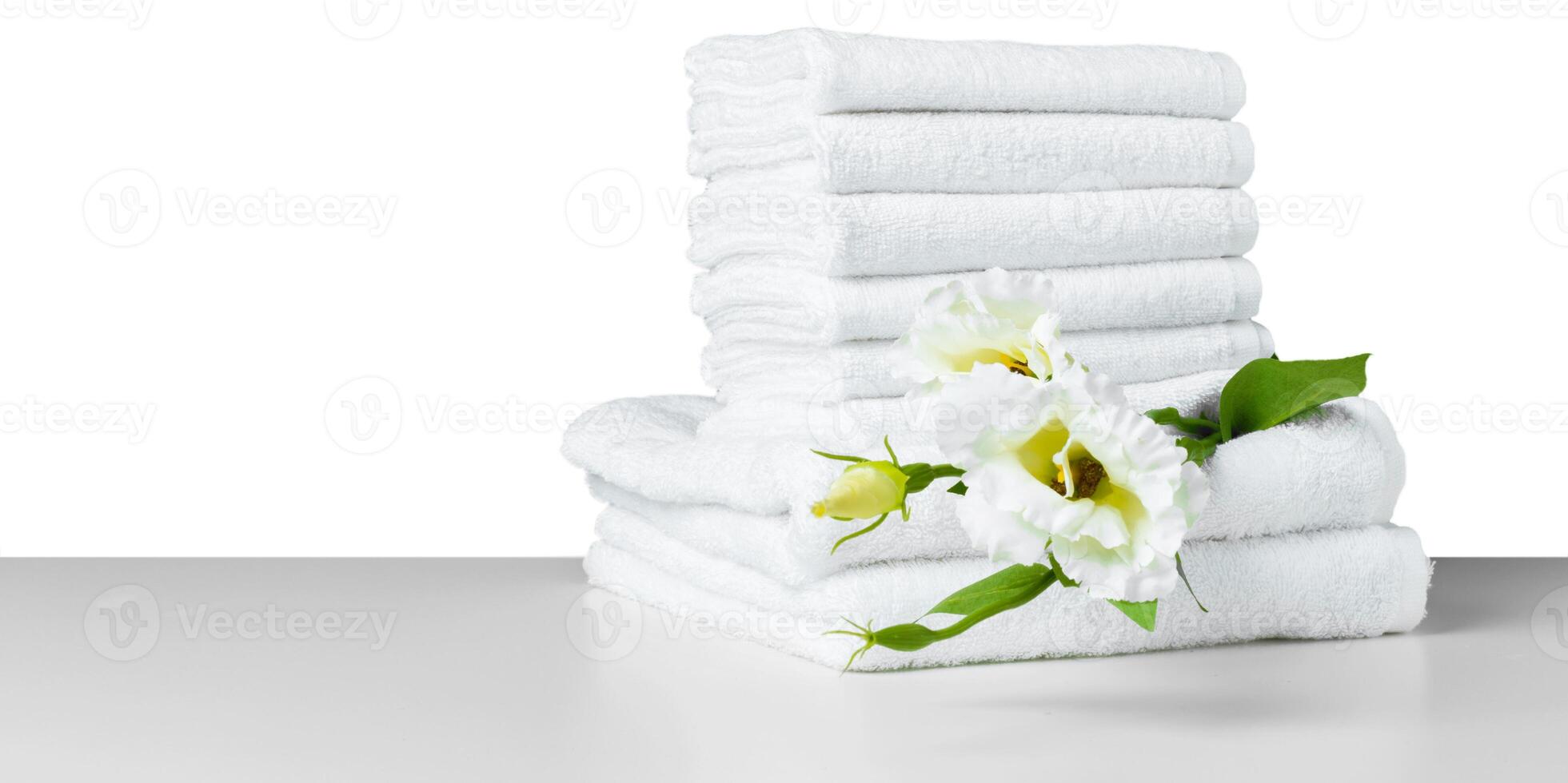 flower with stack of white towel photo