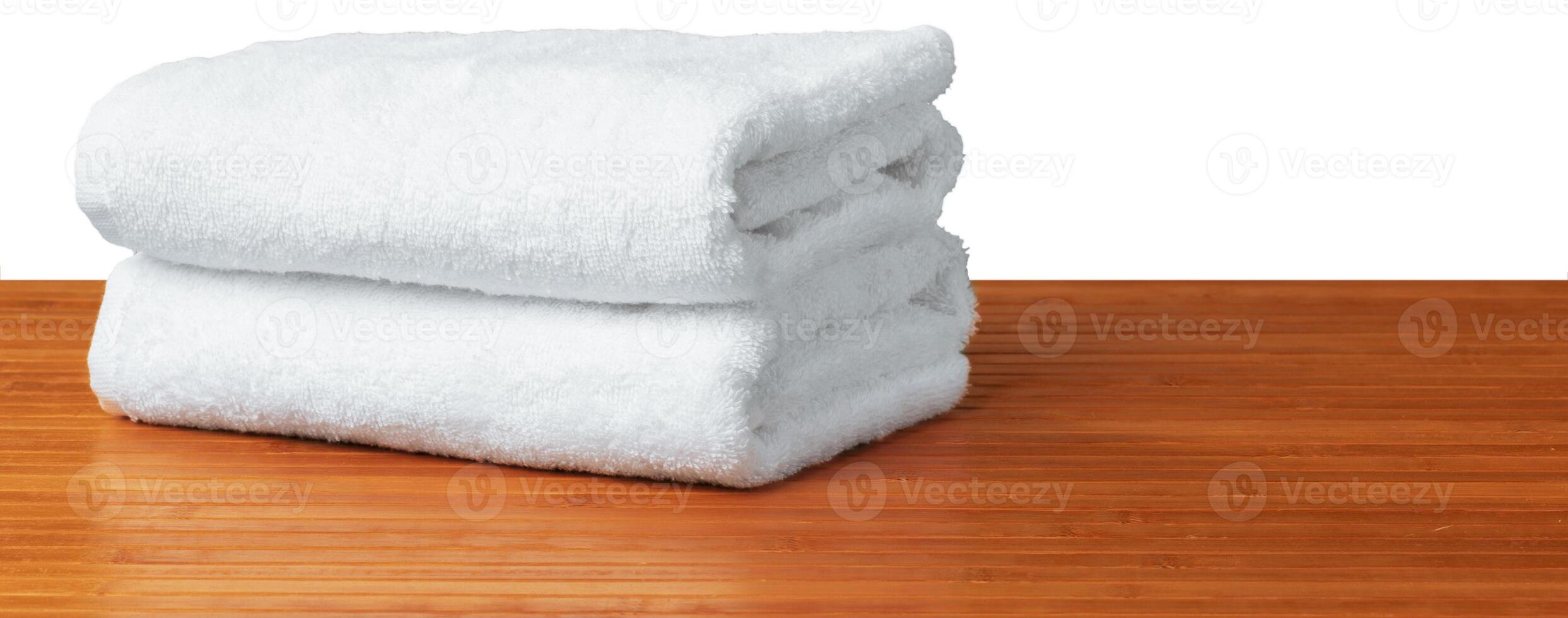 white spa towels on the table photo