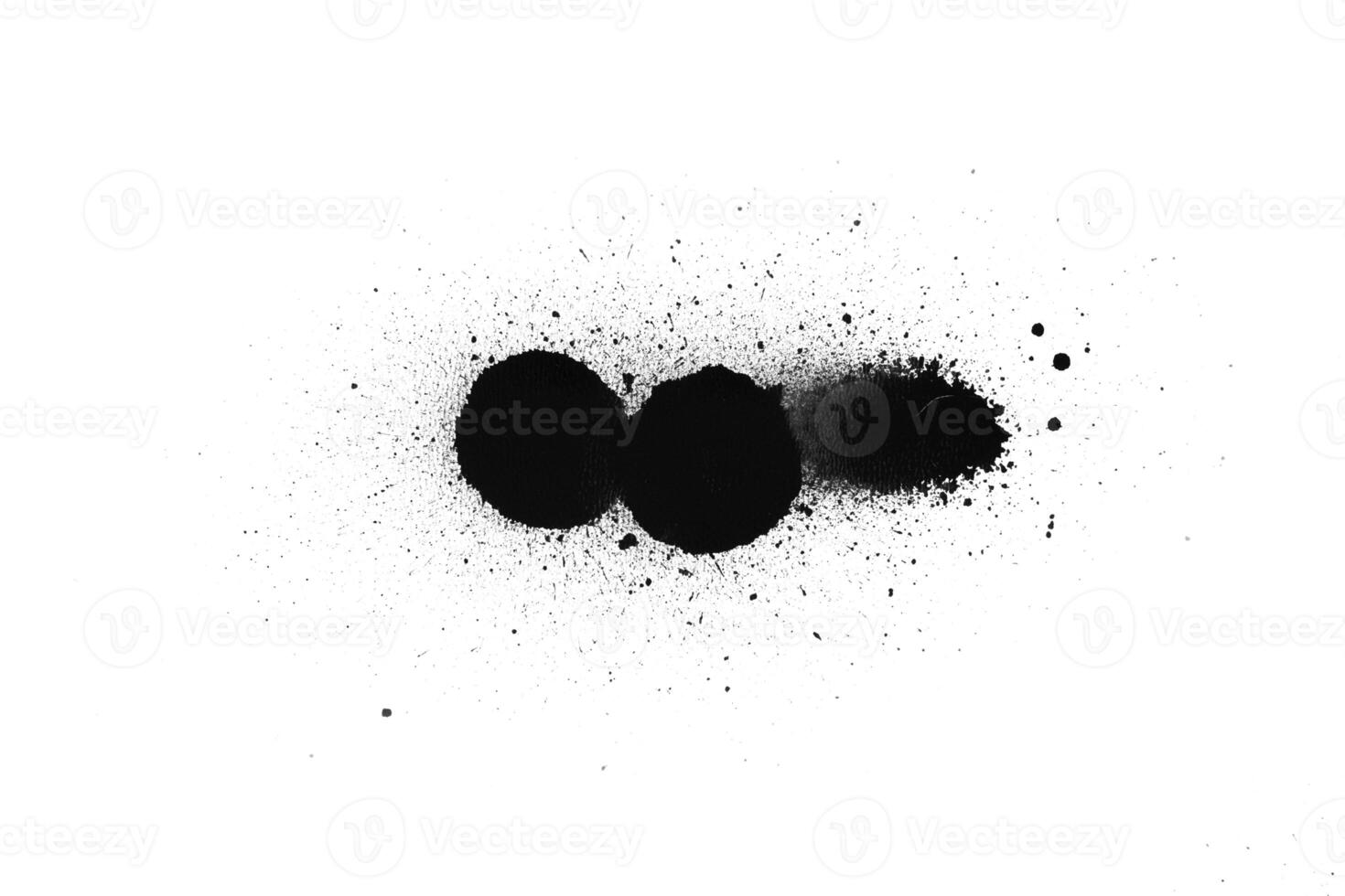 Black color spray paint on a white background paper photo