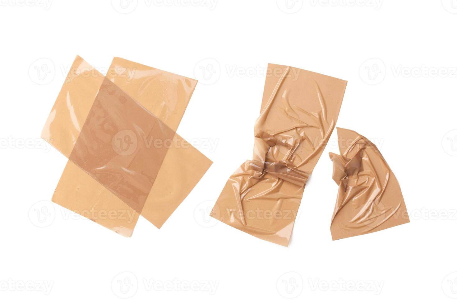 collection of various adhesive tape pieces on white background photo