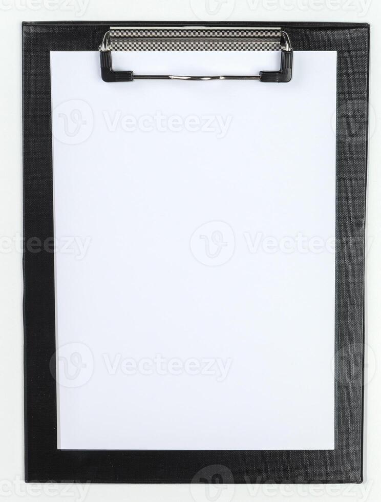 Classic clipboard with blank white paper on isolated background photo