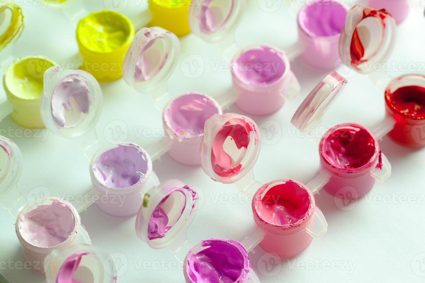 set of brightly colored acrylic paint photo