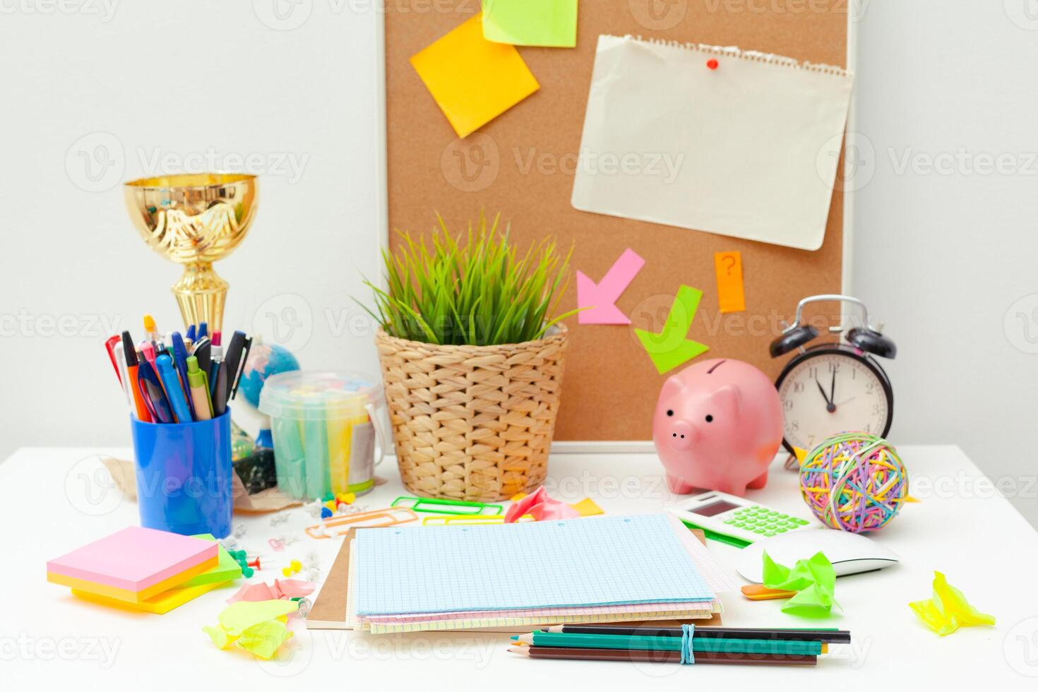Work place of a creative person with a variety of colorful stationery objects photo