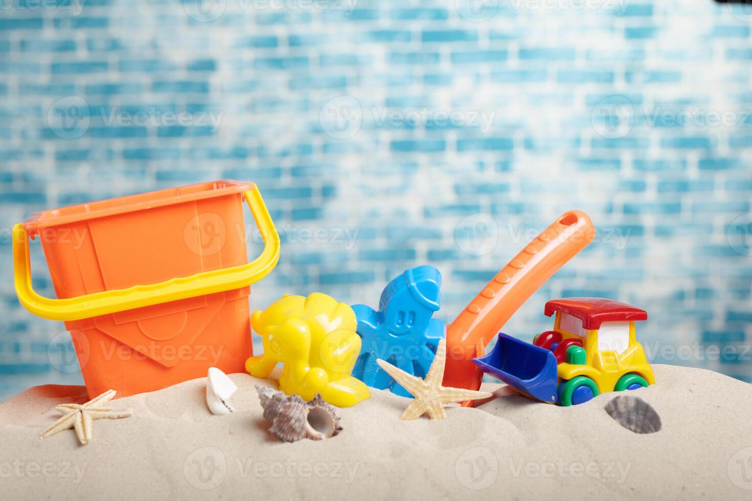 Children's toys on sand photo