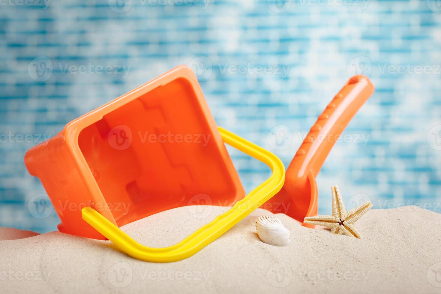 Children's toys on sand photo
