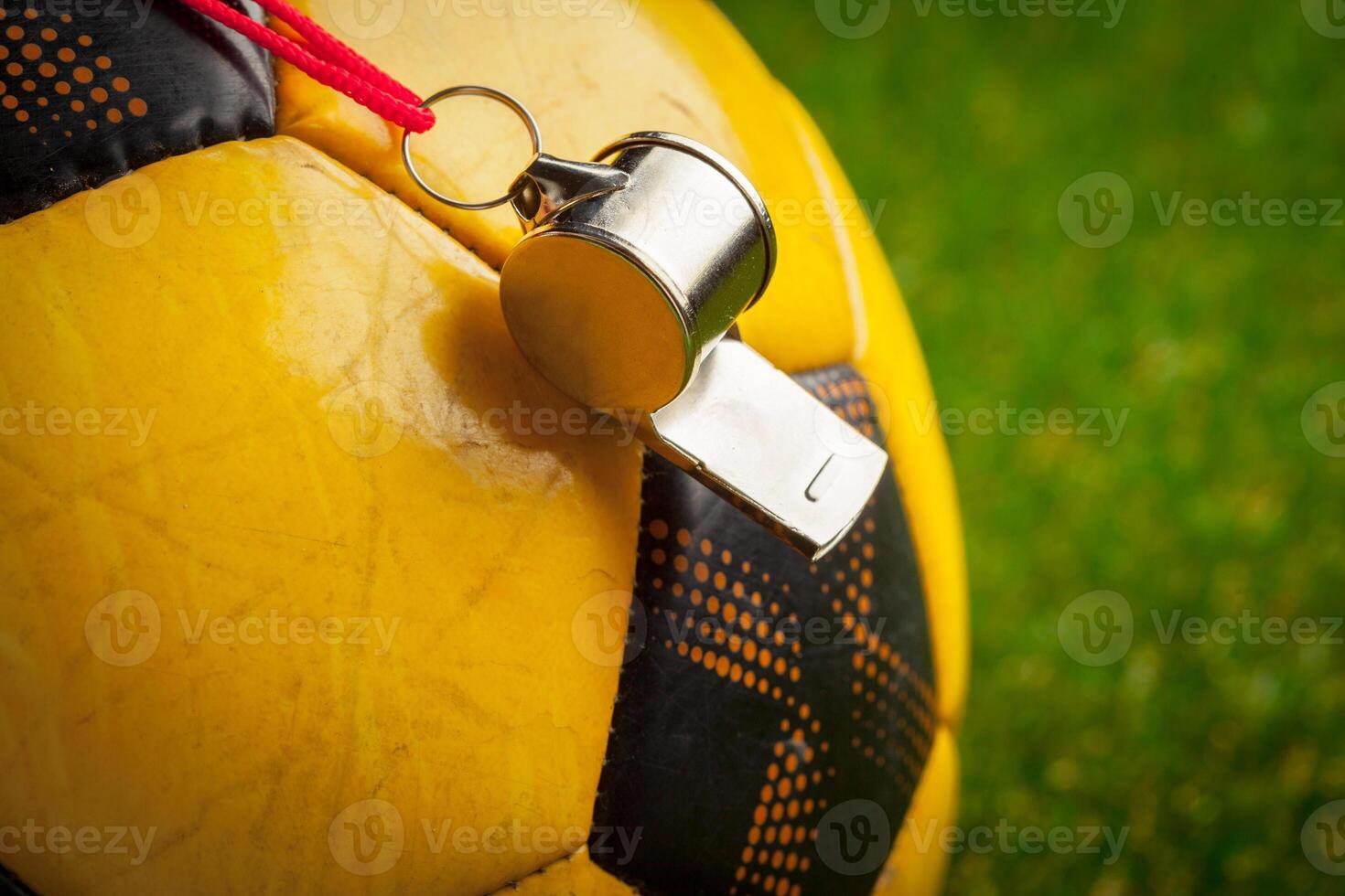 soccer ball on the green field photo