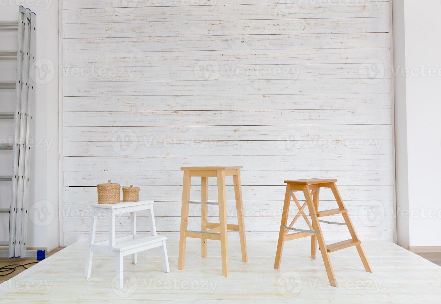 chairs standing in white room photo