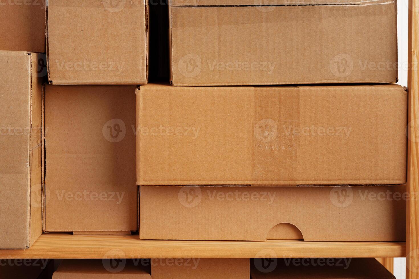 Cardboard boxes stacked in a pile for background photo