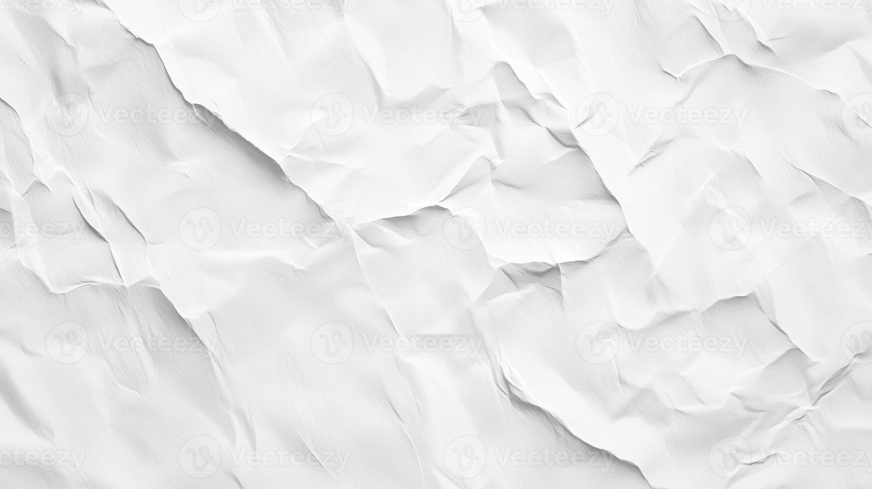 Crumpled white paper texture on a plain background revealing subtle peaks and valleys of the surface photo