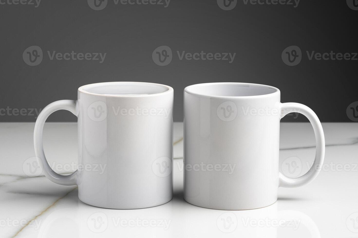 Ceramic cups on marble table against gray background photo