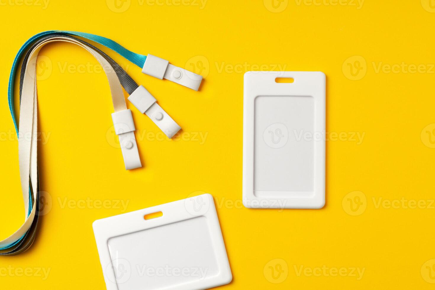 Blank badge with string on yellow background photo