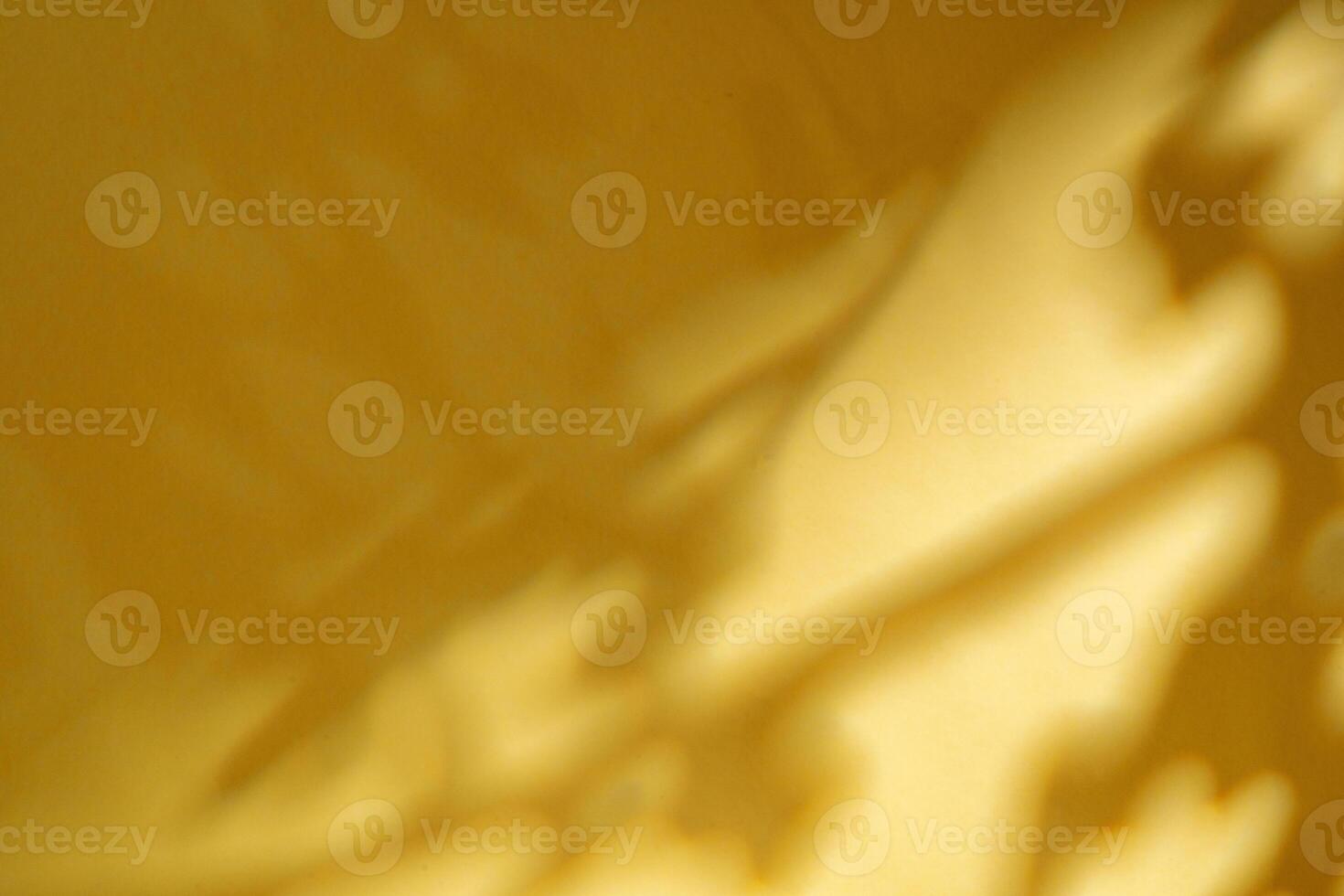 Abstract shadow from the window on yellow background photo