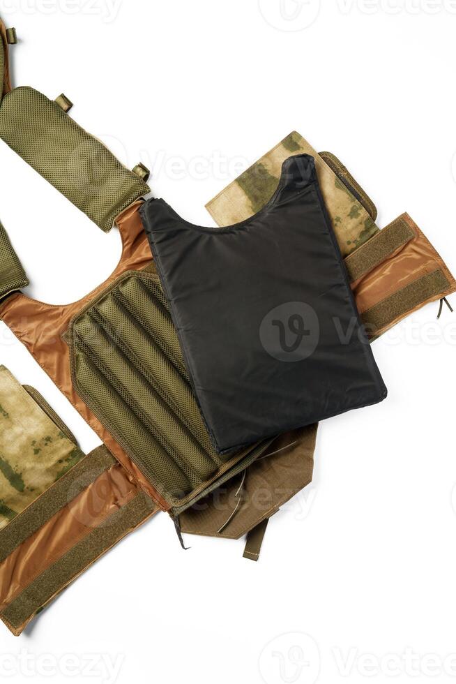 Camouflage bulletproof vest isolated on white background photo