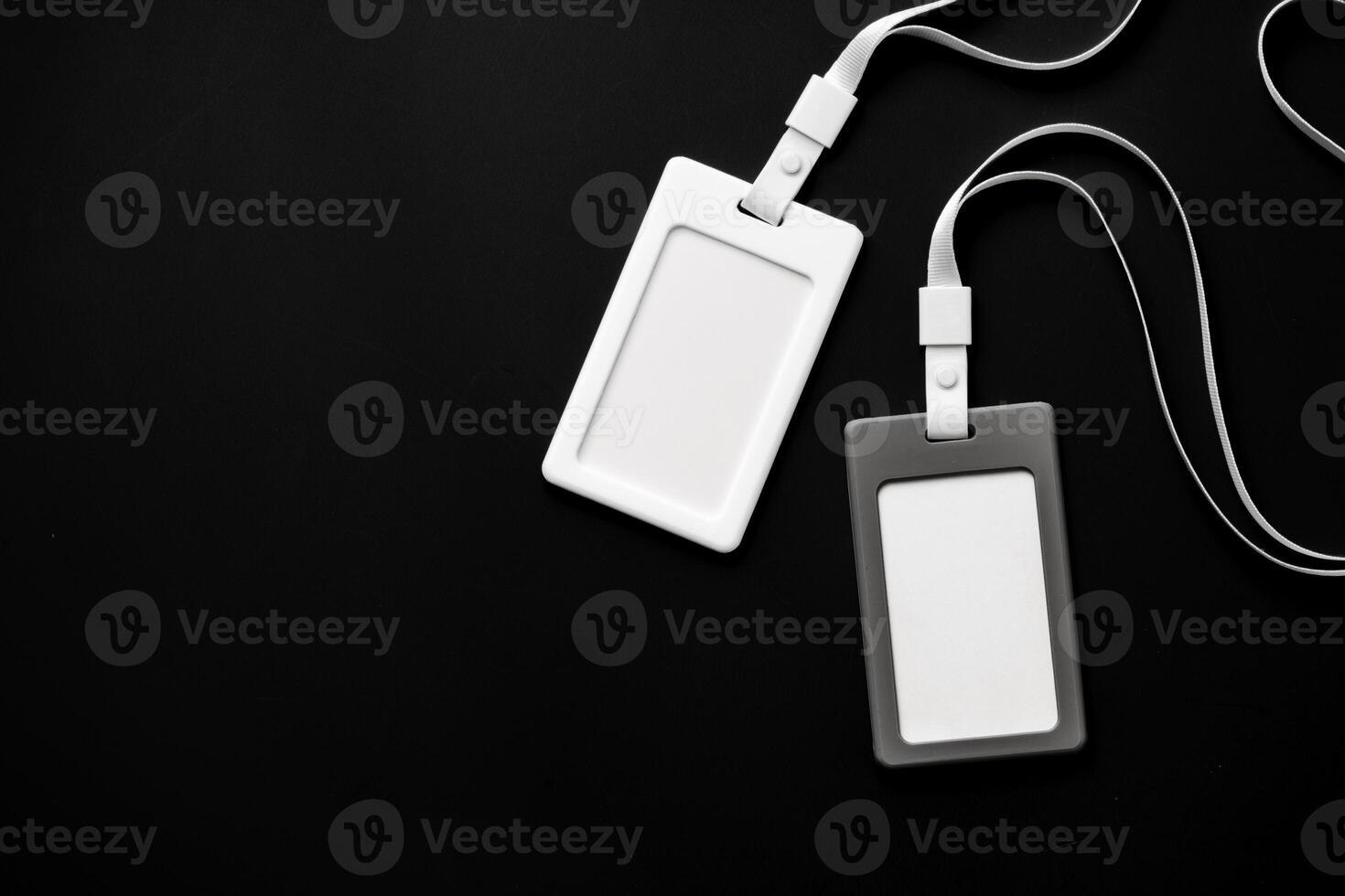 Blank badges on black background top view photo