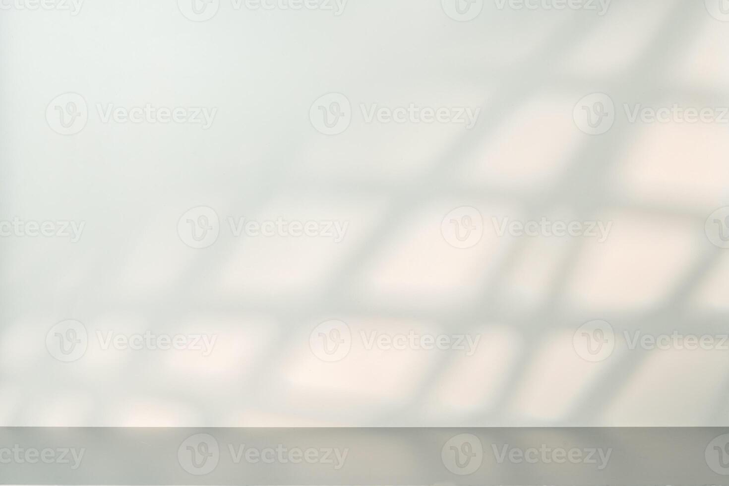 Gray background with shadows and light from window photo
