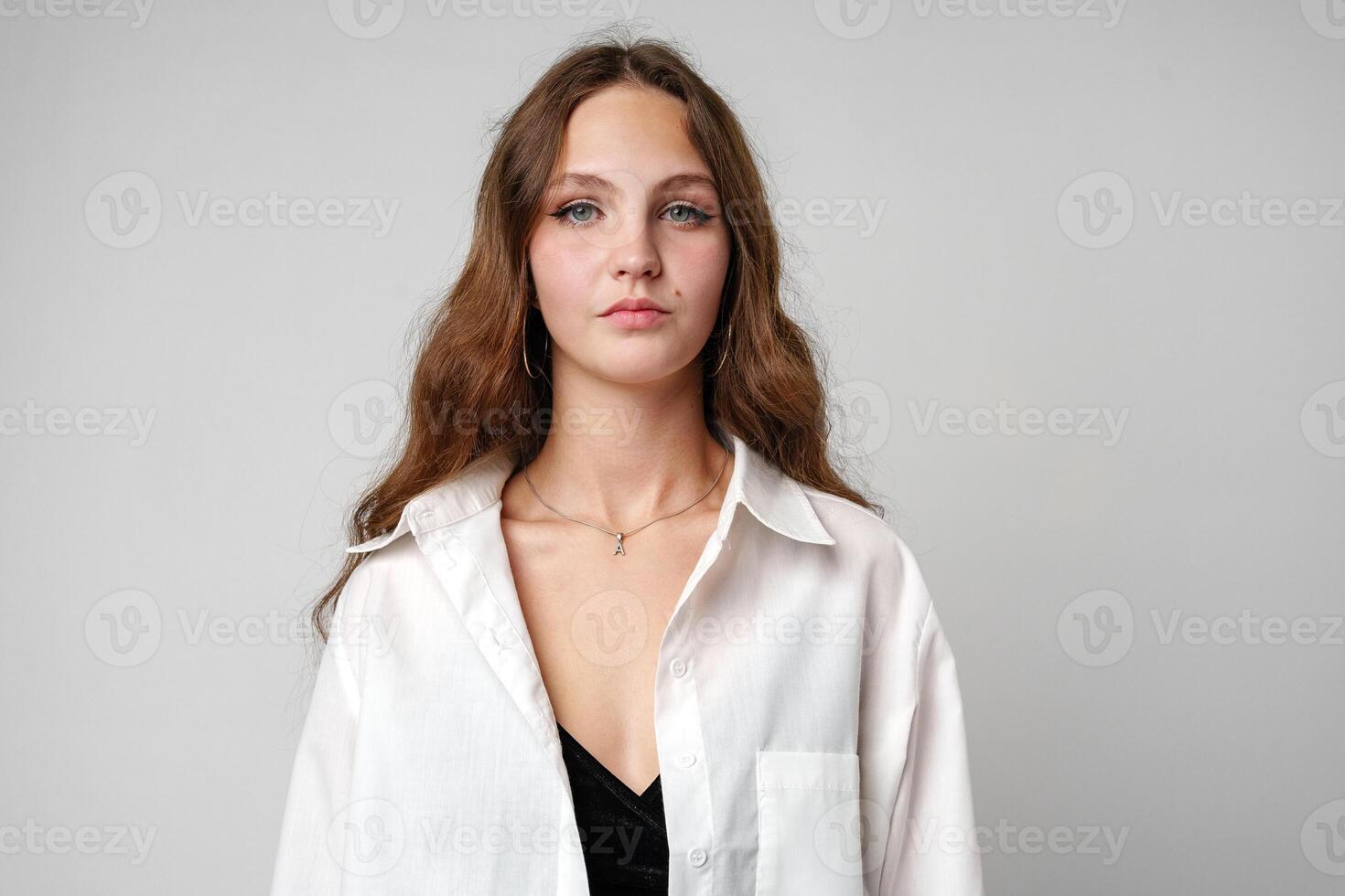 Woman With Long Hair Wearing a White Shirt photo