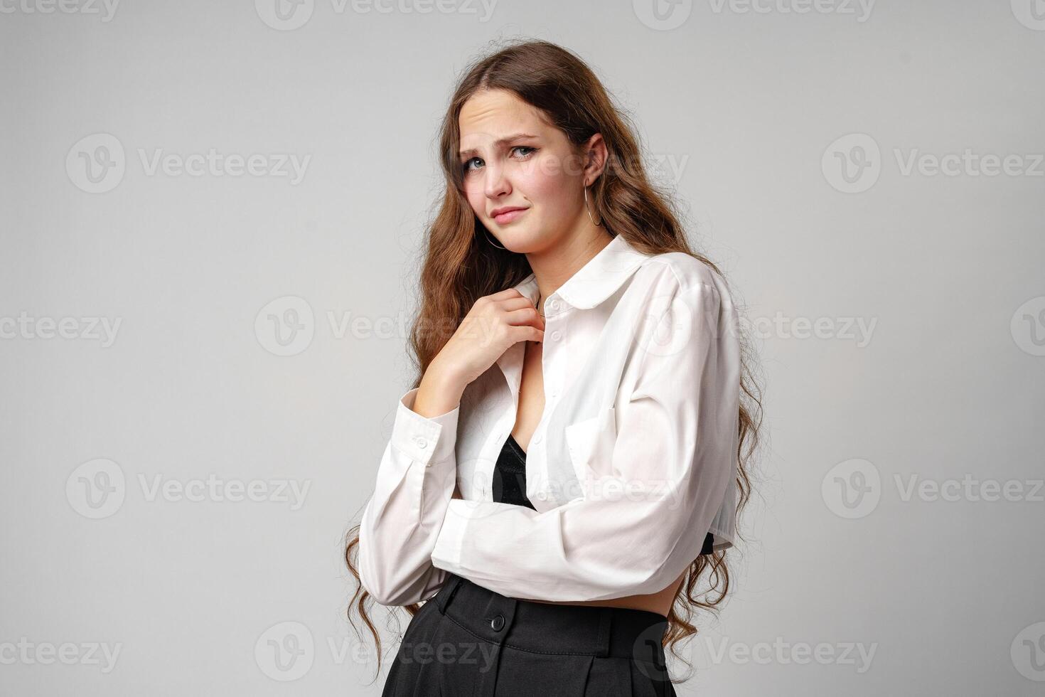 Woman in White Shirt and Black Pants photo