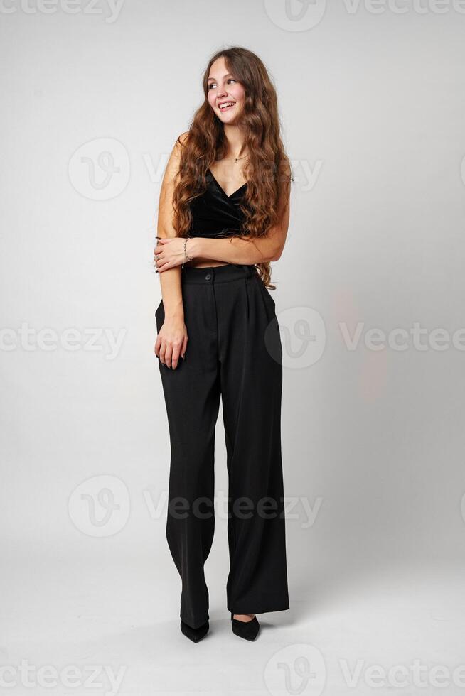 Woman in Black Top and Pants photo