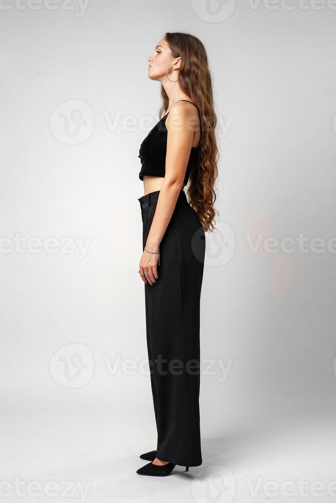 Woman in Black Crop Top and Pants photo