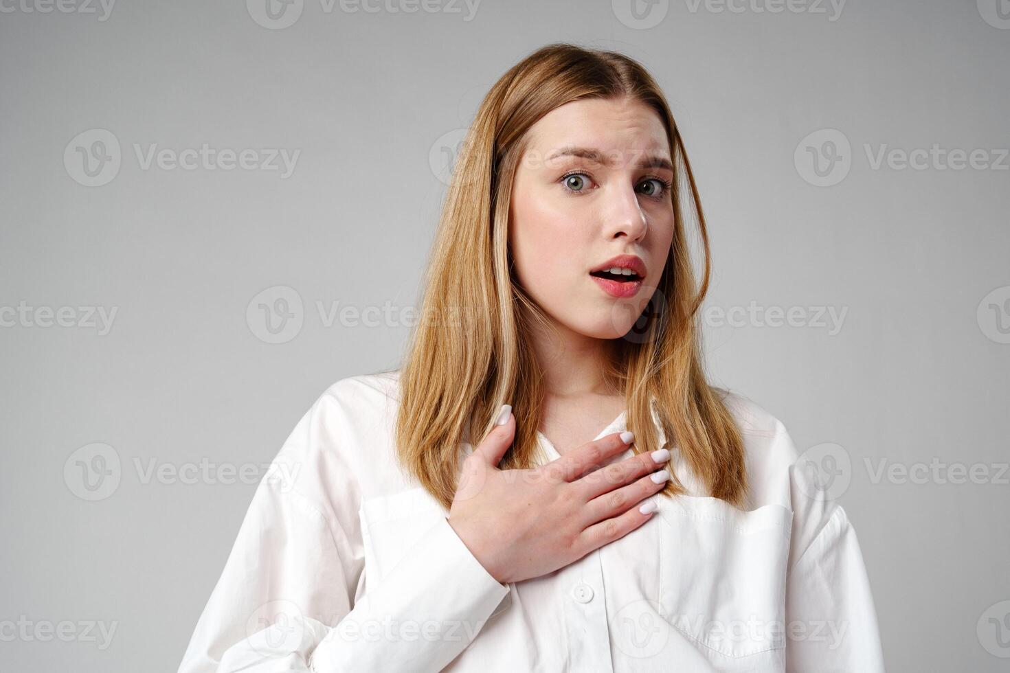 Young woman in a state of shock or surprise photo