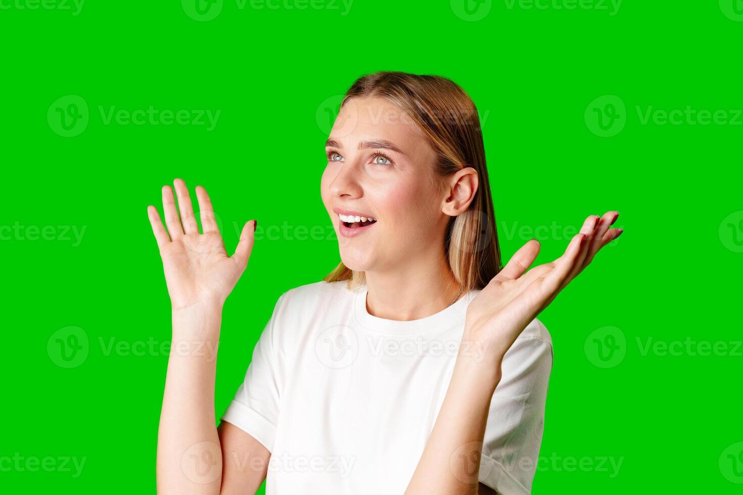 Young Woman in White T-shirt Making a Surprised Face photo