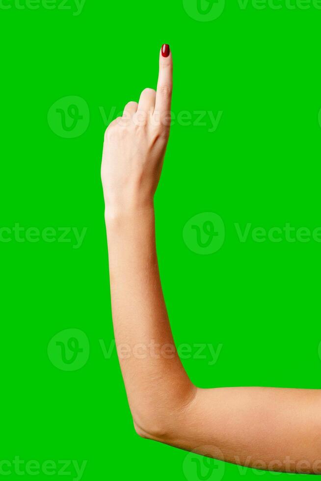 Womans Arm Hand Sign Raised in the Air photo