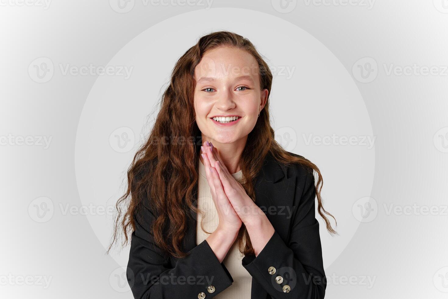Startled Woman With Surprised Expression on gray background photo
