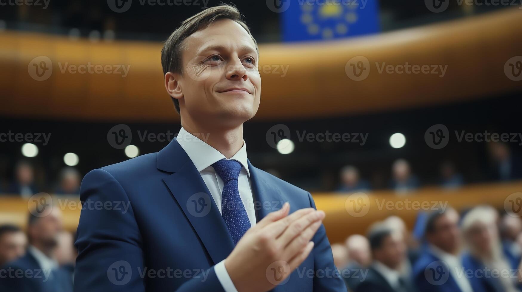 European politician delivers a speech while addressing an audience in a formal setting during a parliamentary session photo
