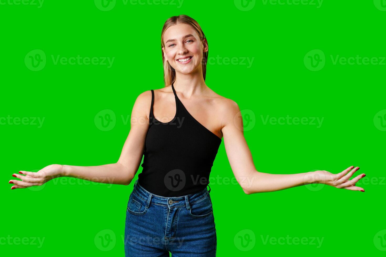 Young Woman Holding Out Hands against green background photo