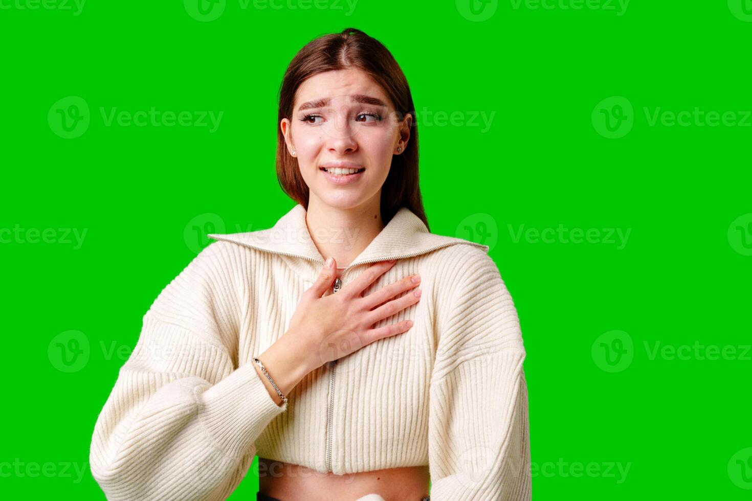 Woman in White Sweater Posing for Picture photo