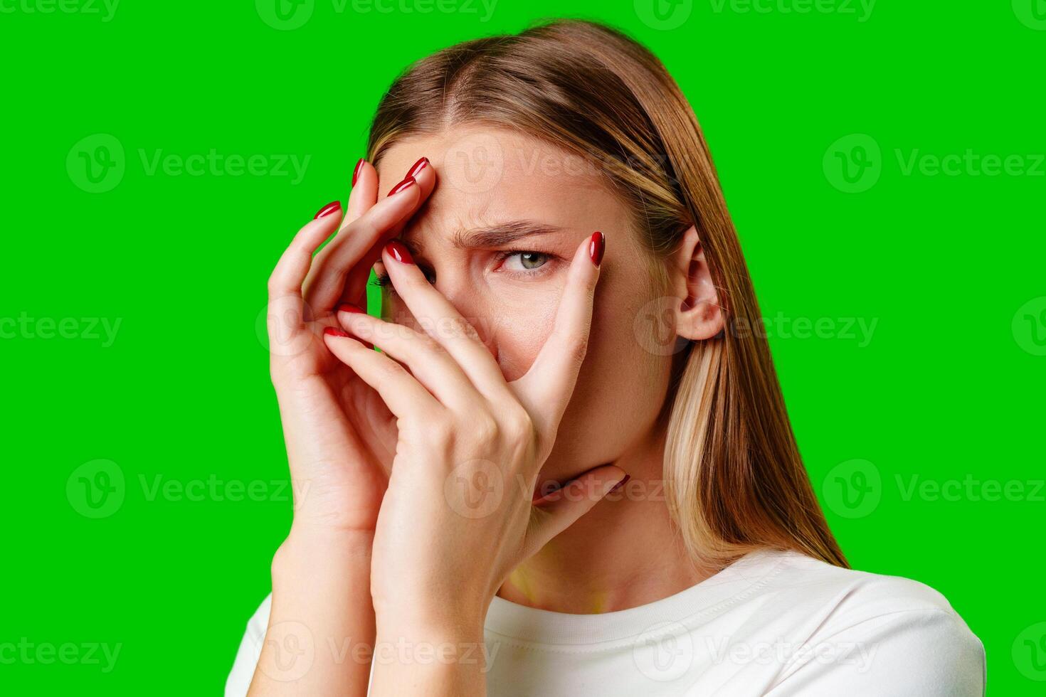 Young Woman Covering Her Face With Hands photo