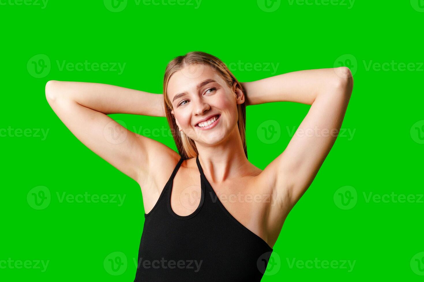 Blonde Woman in Black Tank Top Posing for Picture photo