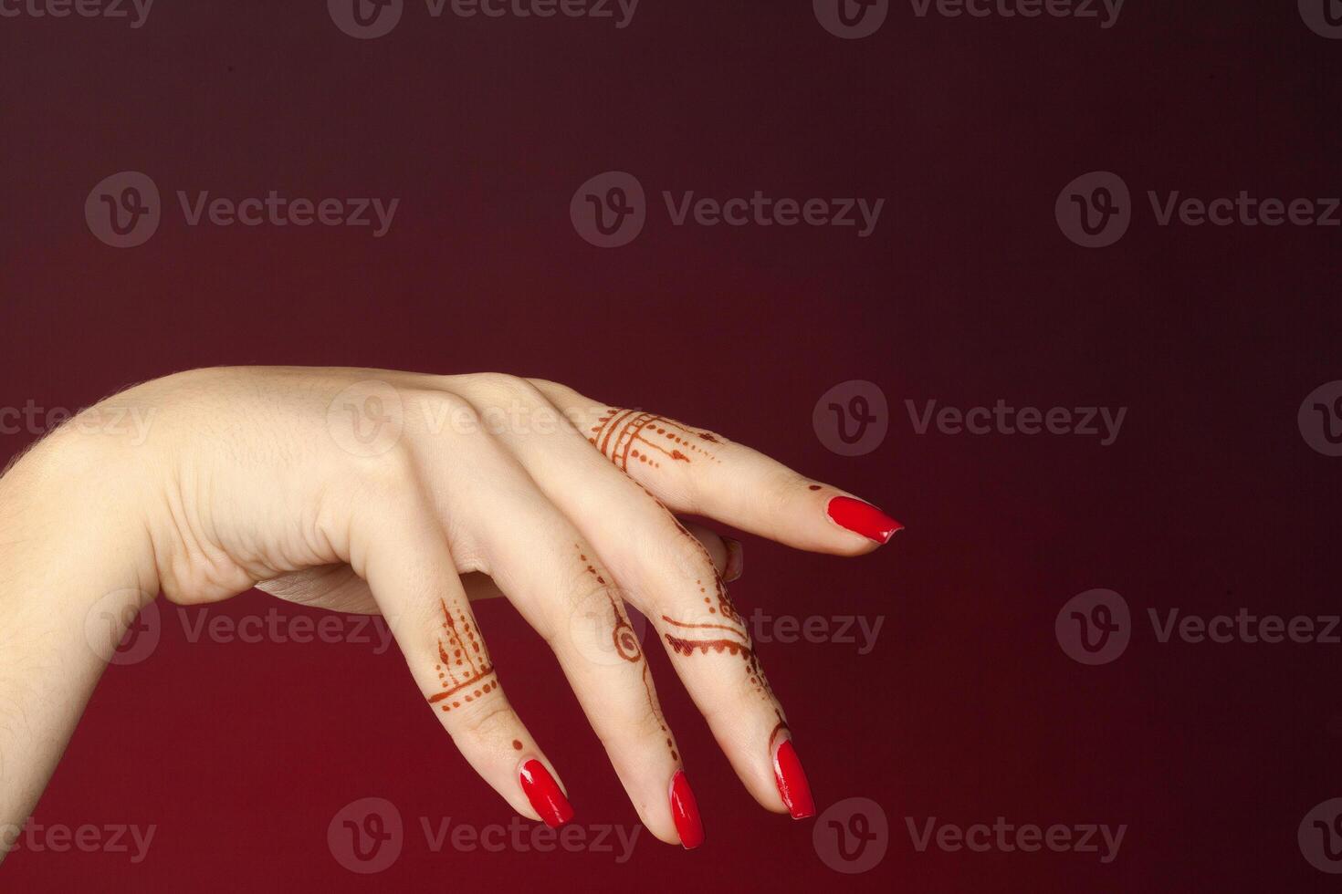 Woman Hands with mehndi photo