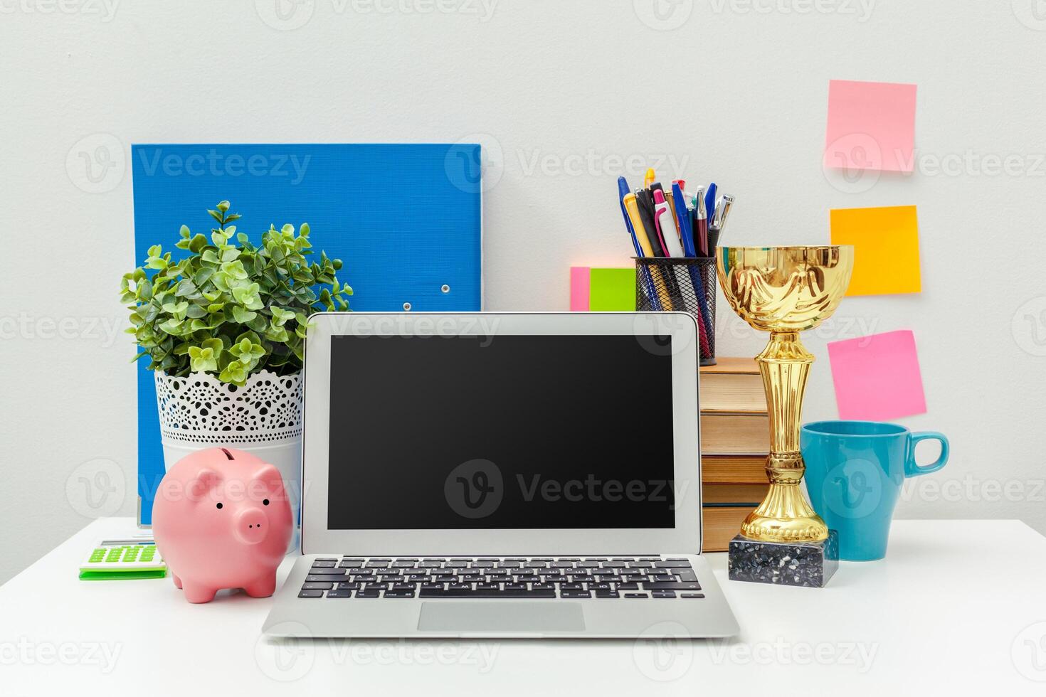 Work place of a creative person with a variety of colorful stationery objects photo