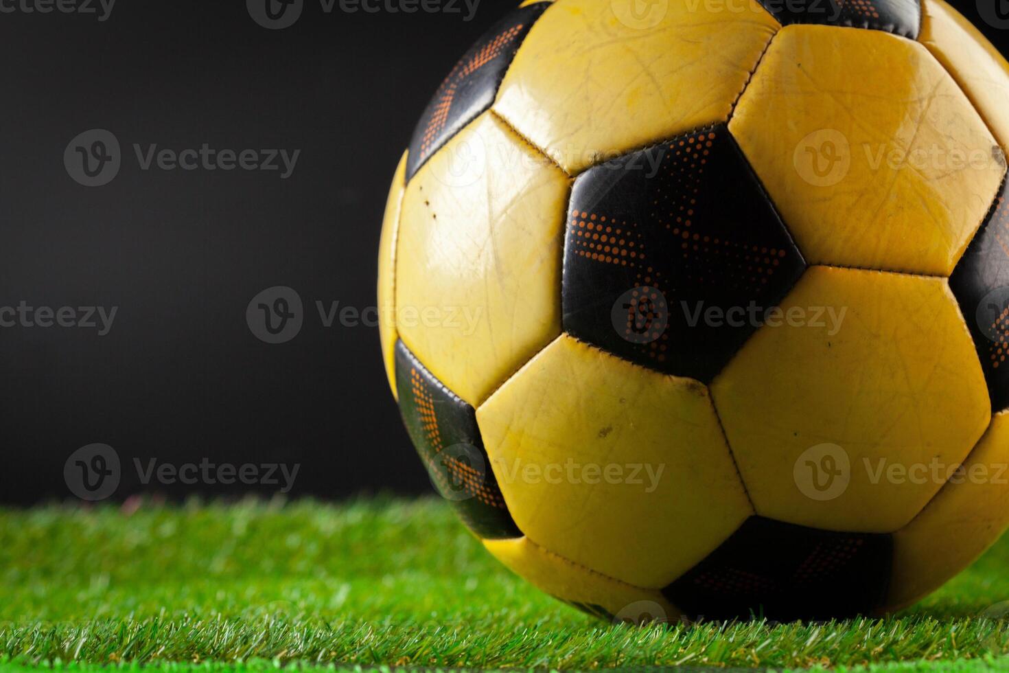 soccer ball on the green field photo