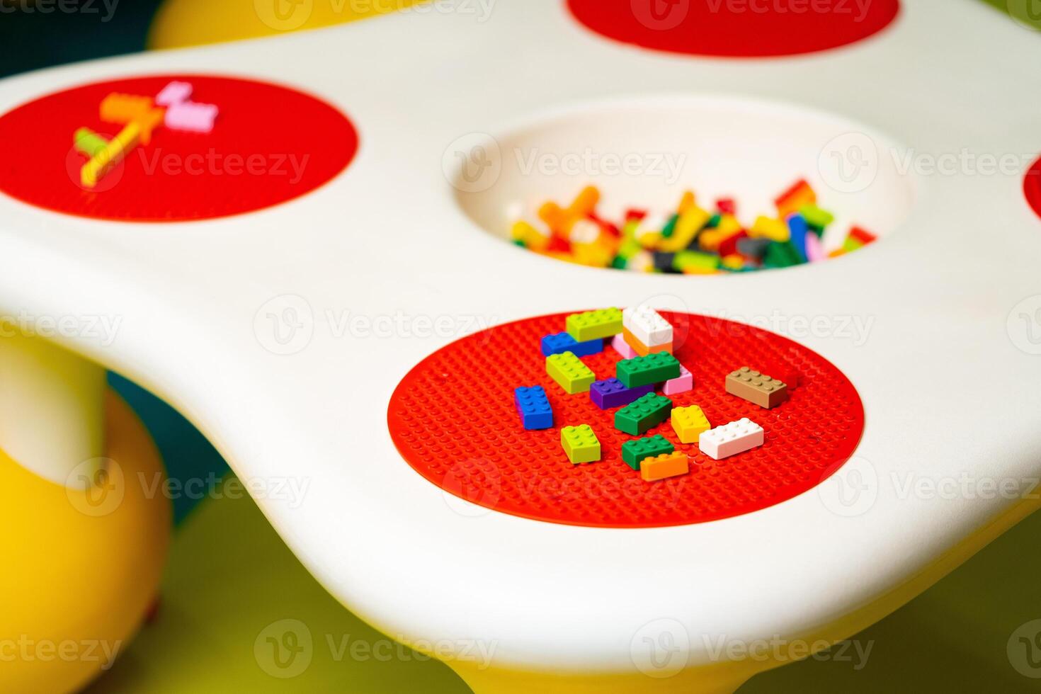 Childs Play Table With Toys Close-Up photo